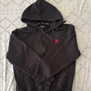 Primitive Black Zip-Up Hoodie with Red Logo